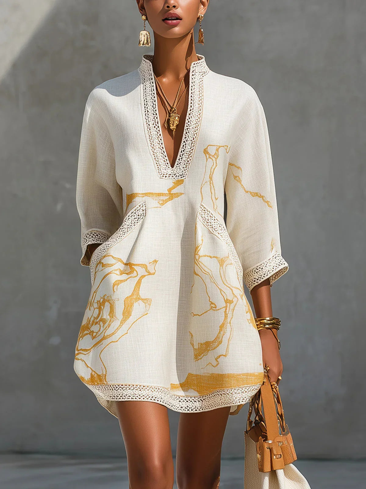 Donatella | Mini black dress with golden marble print and crochet lace