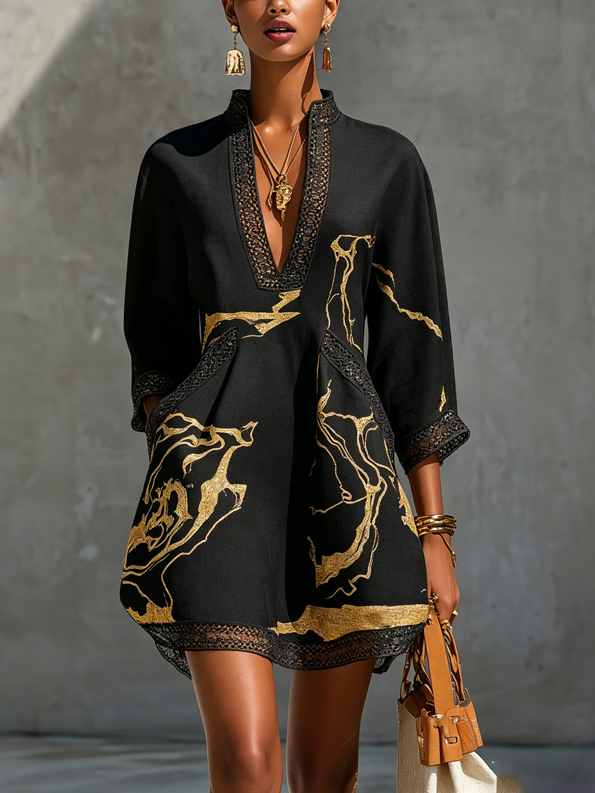 Renata - Short lace dress with gold print and deep V neckline