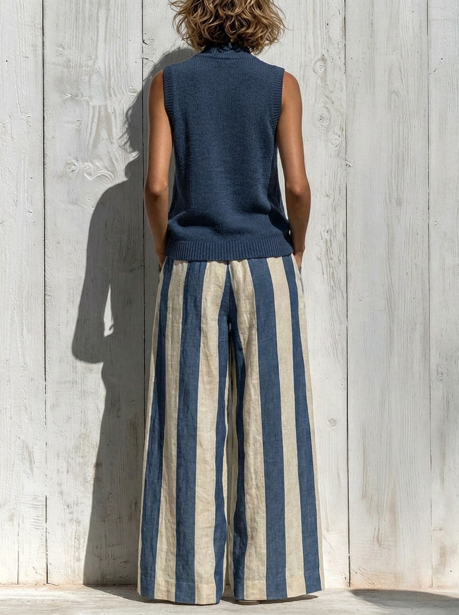 Complete sleeveless top and wide striped pants